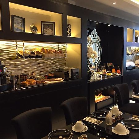 โฮเต็ล เลอ เพทิท เมดเดอเลนน์ Hotel ปารีส ภายนอก รูปภาพ
