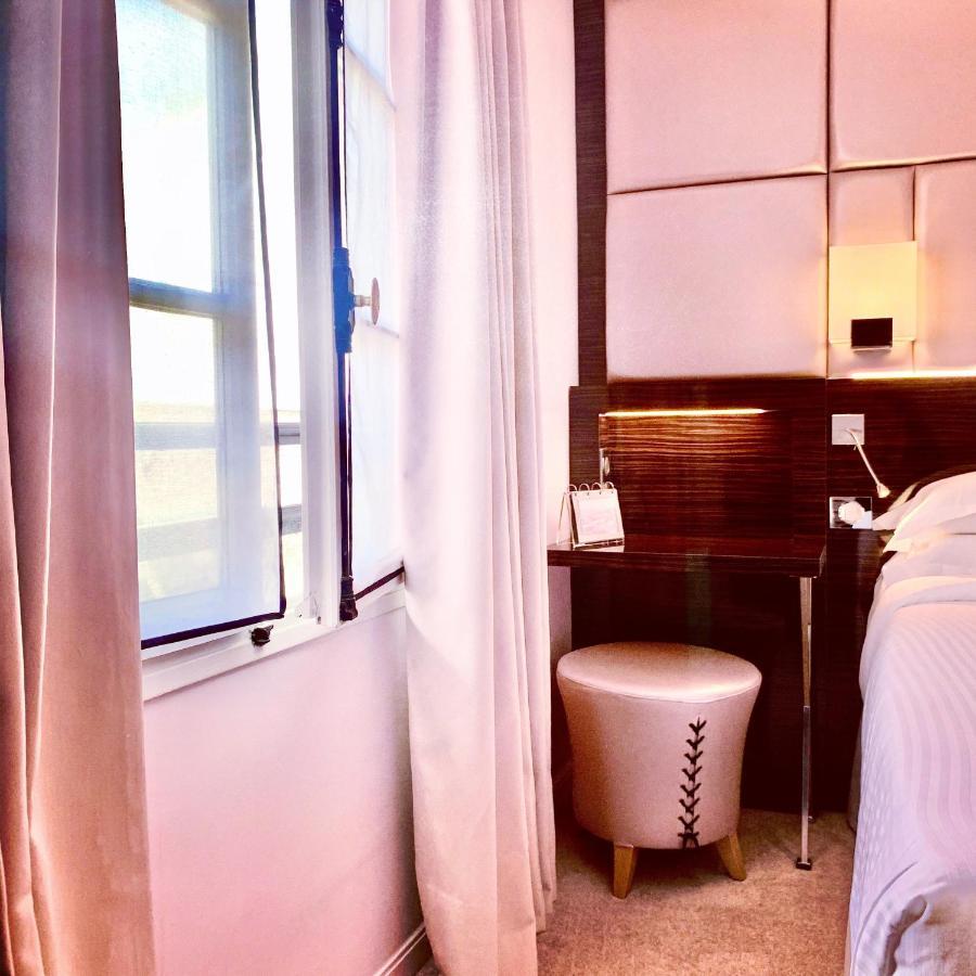 โฮเต็ล เลอ เพทิท เมดเดอเลนน์ Hotel ปารีส ภายนอก รูปภาพ