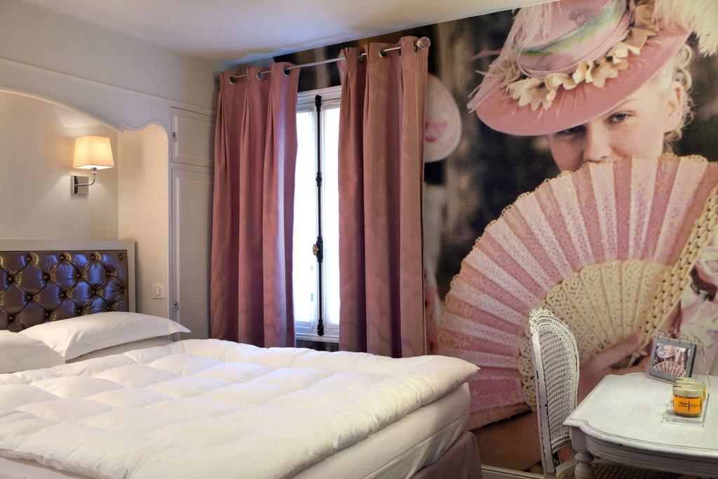 โฮเต็ล เลอ เพทิท เมดเดอเลนน์ Hotel ปารีส ภายนอก รูปภาพ