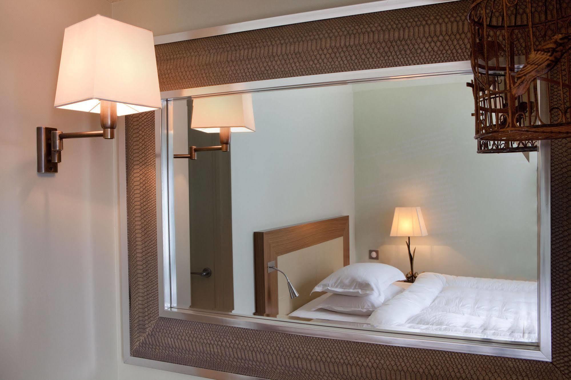 โฮเต็ล เลอ เพทิท เมดเดอเลนน์ Hotel ปารีส ภายนอก รูปภาพ